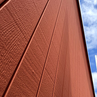 Red wooden facade with KEiM Lignosil-Artis